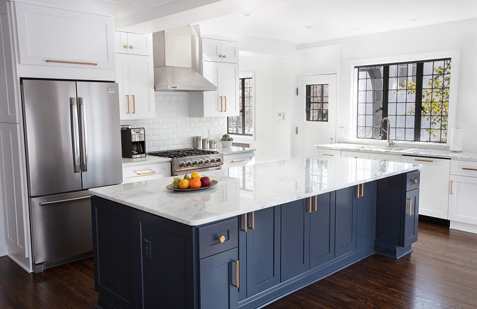 kitchen remodel in toledo ohio with a blue island and white cabinets