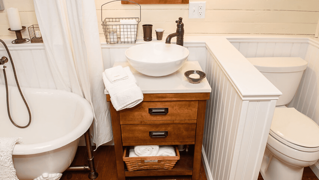 Modern bathroom featuring a country style sink and vanity