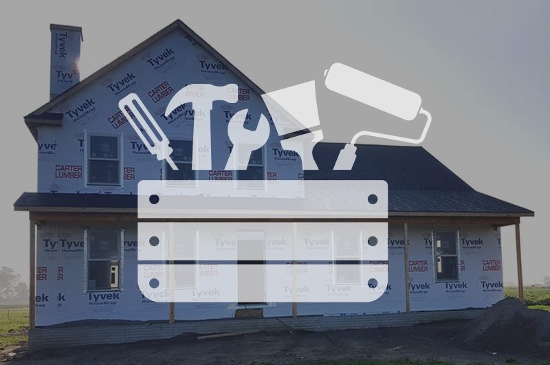 Tool box over an image of an unfinished home